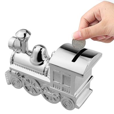 China Eco-friendly material exclusive box money alcancias creative children kids savings toy bank cute train gift metal baby piggy banks for kids for sale