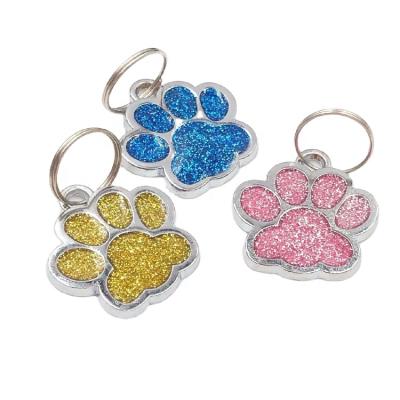 China Custom Colored Metal Europe Soft Enamel Dog Palm Dog Tag With Glitter Laser Logo for sale