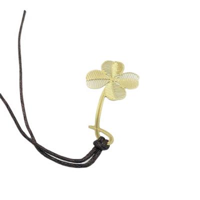 China Custom Gold Metal Four Leaf Clover Bookmark Clip Europe Gold Etching for sale