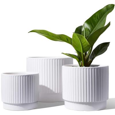 China Modern White Ceramic Flower Pot Round Outdoor Porcelain Planter Flower Pots Bar Plant Pots For Garden Home Decor for sale