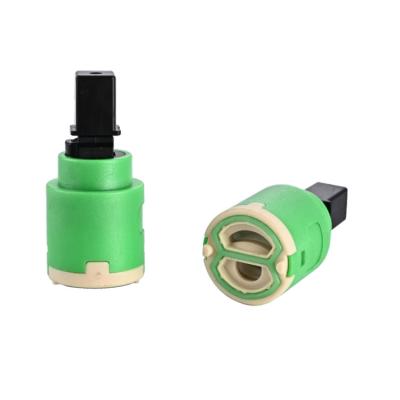 China Modern Quick Opening Faucet Cartridge 20 Mm Plastic Handle Single Cold Core Faucet Valve for sale