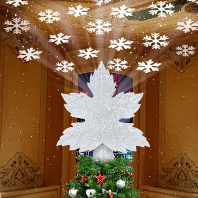 China 3D Glitter Hoja de arce Copo de nieve LED Árbol de Navidad Topper Decorar Proyector Para el Ornamento del Árbol de Navidad en venta