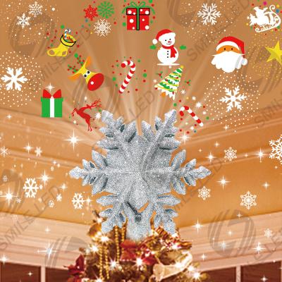 Chine Arbre de Noël Topper Décorations projecteur Lumière 3D Rotation creux Glitter Flocon de neige Xmas Arbre de Noël décor avec 6 étoiles de projection à vendre