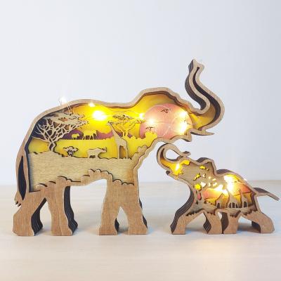 China Minimalist Home Office Decorations Table Top Multilayer Carving Wood Crafts Forest Animals Wood Carving Creative for sale