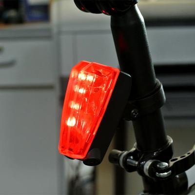 China 2 Laser Mark Lane Warning Safety Light Rear Tail Bicycle Safe Cycling Light For Night Cycling for sale