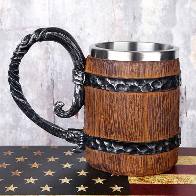 China Viable Hot Sale 3D Stainless Steel Gothic Barrel With Iron Handle Skeleton Resin Craft Mug for sale