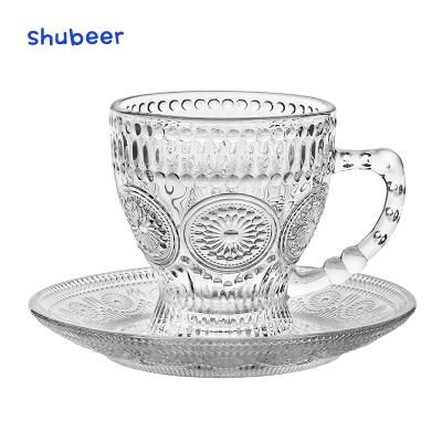 China Retro Stocked Embossed Palace Style Sunflower Coffee Cup And Saucer Set Special Cup And Saucer For Afternoon Tea for sale