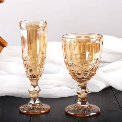 China Flexible Champagne Amber Embossed Glass Thickened Red Wine Carved Glass Cups for sale