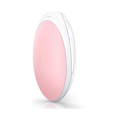 China Hotel Winter Gift Reusable Pocket Silicone Warmer Mini Rechargeable Hand Warmer for sale