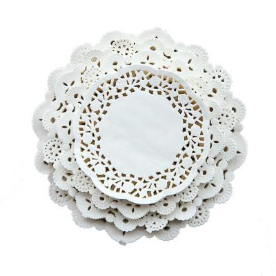 China New 12 inch hotel room home restaurant kitchen round flower shape design paper lace doilies white hollow place mat with best price for sale