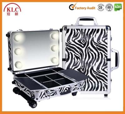 China Storage or Display Cosmetics Mini Studio Togo Makeup Case, Zebra rolling cosmetic case with light mirror for sale