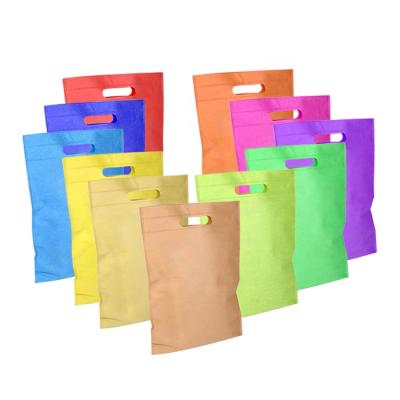 China Various Colors Eco Friendly Non Woven Printed Die Cut Handle Bag for sale