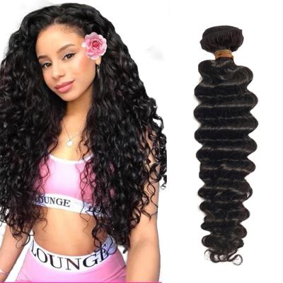 China 10A Curly Malaysian Hair Bundles 24 Very Young Girls Curly Virgin Hair for sale