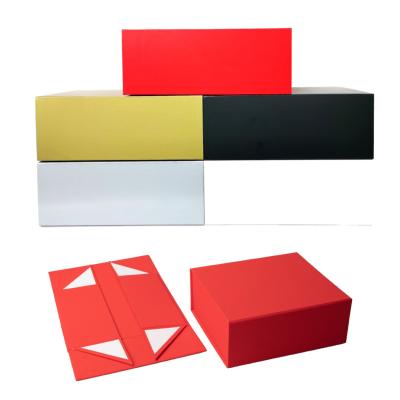 China Biodegradable In Low MOQ Rigid Flat Magnetic Folding Gift Box Stock Black Color For Packaging for sale