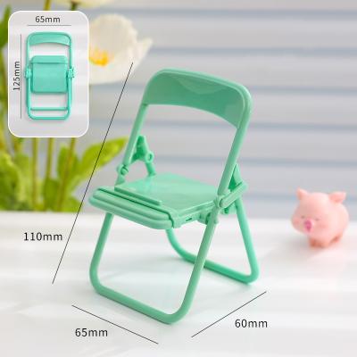 China New Foldable Lazy Stand Holder Decoration Small Desk Chairs Smartphone Accessories Stand Adjustable Creative Portable Mobile Phone Stand for sale