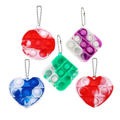 China Mini Silicone Stress Relief Sensory Effort Release Dimple Single Snap Hand Push Pop Bubble Key Chain Toys For Kids Adults for sale