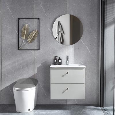 China Environmental Friendly Single Sink Basin Wall Hanging Modern Bathroom Storage Cabinets With Round Mirror for sale