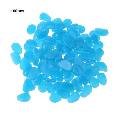 China Viable Polished Blue Luminous Pebble Stone Glow In Dark Aquarium Fish Tank Decor Rocks for sale