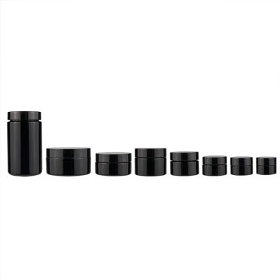 China High Food Grade 3.5 5 10 18 60 150 200 260ml Empty Spice Containers Round Black Purple UV Glass Jar With Lids for sale