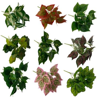 China Realistic Green Artificial Leaf Branches Bushes For Home Wall Decorative for sale