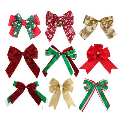 China Factory Direct 100% Polyester Wired Edge Large Christmas Snowflake Bows Large Grig 26*32cm Christmas Bows Tie For Decoration for sale