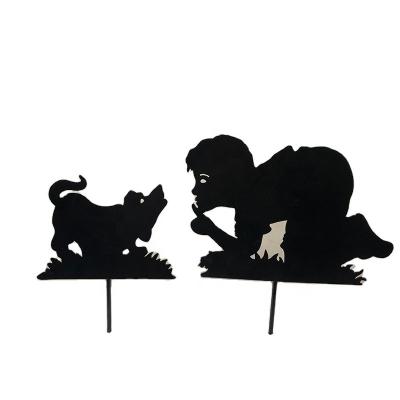 China Art Decor Metal Garden Stake Yard Metal Silhouette Art Boy With A Dog Outdoor Decoration for sale