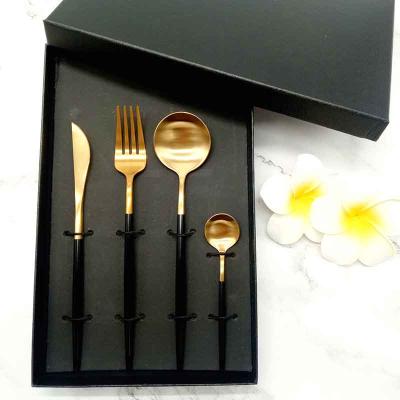 China Viable Hot Selling 304 Stainless Steel Portugal Cutipol Matte Gold Plated Black Handle Cutlery Set for sale