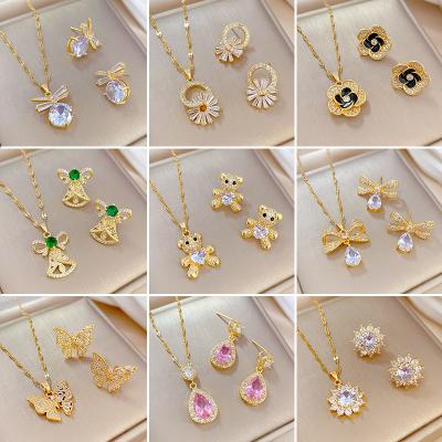 China Elegance Premium CLASSIC Luxury Gold Plated Stainless Steel Earrings Set Jewelry Green Zircon Gemstone Pendant Necklace For Women for sale