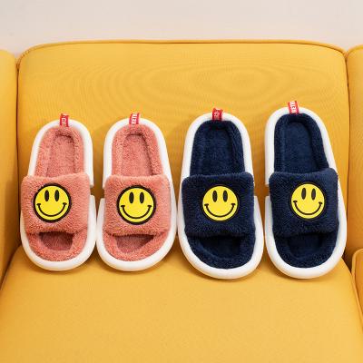 China Damping 2021 Cute Smile Slippers Bedroom Home Indoor Happy Warm Women Ladies Smile Face Slippers Latest Chinese Winter Slippers for sale