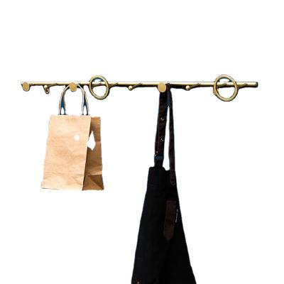 China Home Sustainable Metal Iron Gold Geometry Shaped Peg Coat Towel Hanger Rack Wall Mounted for sale