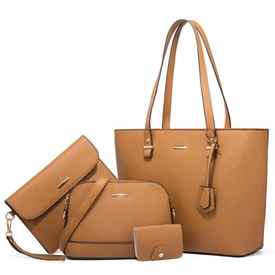 China Portable Stock 4 Pcs Sets Ladies Large Capacity Messenger Bag Vegan Leather Tote Bag Women Luxury Purses And Handbags Set Ladies 2022 for sale