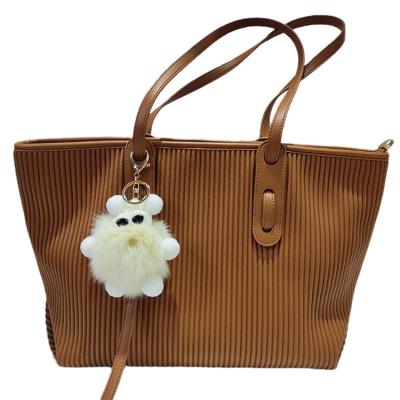 China Portable 2023 Hot Sale Bolsa Customize Fashion Fur Hanging Tag Emboss Pattern Designer Handbags Famous Brands Bags Women Handbags Ladies for sale