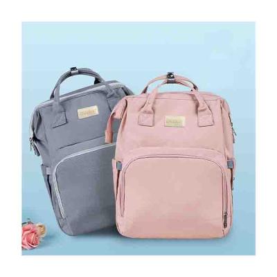 China Mummy outdoor anti-theft bag large capacity fashion logo foldable waterproof custom diaper bag with changing baby sleep bed for sale