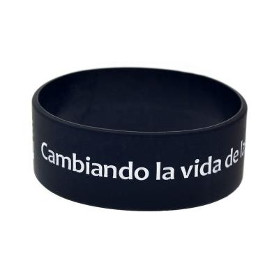 China 25PCS Classic One Inch Black And Green Wide Vida Silicone Wristband Debossed Cambiando for sale