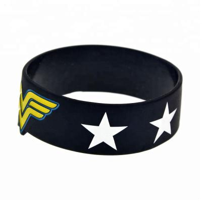 China 25PCS Classic One Inch Wide Blue and Black Wonder Woman with Stars Silicone Bracelet for sale