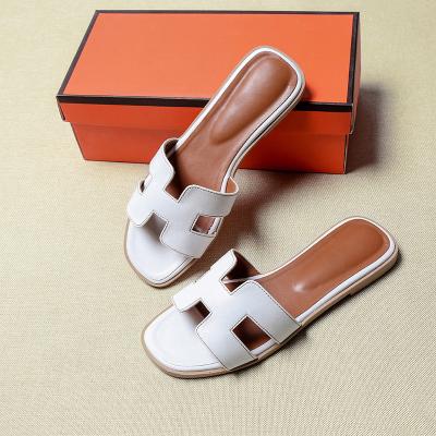 China Fashion trend 2021 new summer hot sale high quality leather slippers fail white women sandal slides shoes for sale