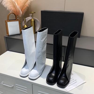 China Waterproof 2021 New CSI Fancy European And American Square Toe Flat Pant Boots Female Heels Deep White High Boots Personality Long for sale