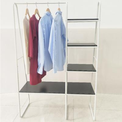 China Clothing Display White Metal Garment Rack With Shelves Free Standing Clothing Rack With Bottom Shelf for sale