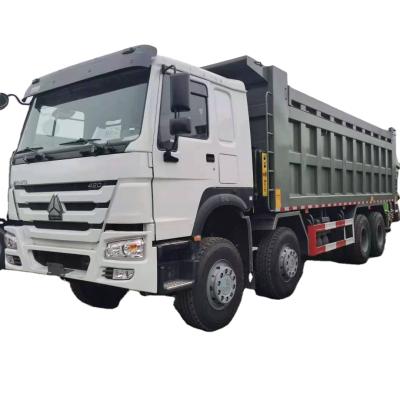 China New Sinotruck howo 8x4 dump truck 27cbm > 8L for sale