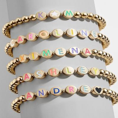 China No Lotus 14k Gold Plated Gold Filled Beaded Ball Customized Name Stacking Stretch Bracelet for sale