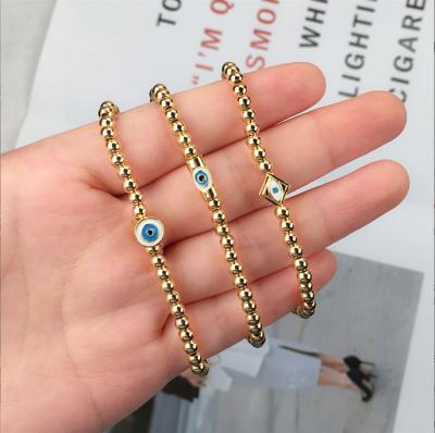 China No Lotus 14k Gold Plated Ball Evil Eye Gold Filled Enamel Stretch Beaded Bracelet for sale