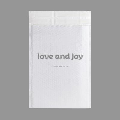 China Custom Strong Adhesive White Matte Poly Biodegradable Bubble Mailer Bags for sale