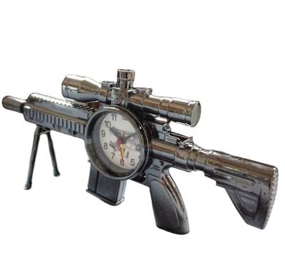 China Wholesale Antique Style Command Child Toy Home Desk Decorative Machine Gun Table Running Alarm Clock for sale