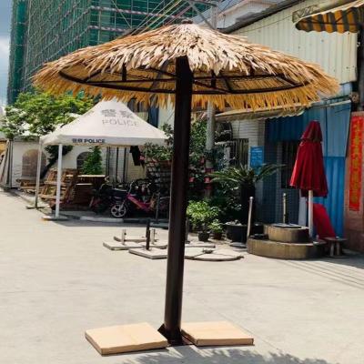 China Sun Wind Rain Proof Patio Umbrella Spread Shape Polynesian Dance Grass Straw Thatch Beach Umbrella Thatch Fire Retardant Synthetic Umbrella for sale