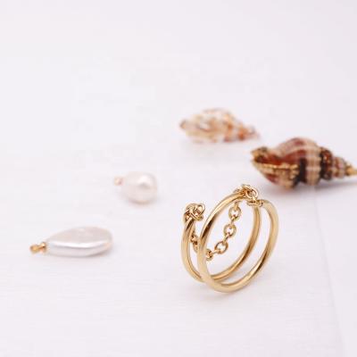 China Latest Fashion Trendy Gold Stainless Steel Accessories Girls Finger Chain Rings for sale