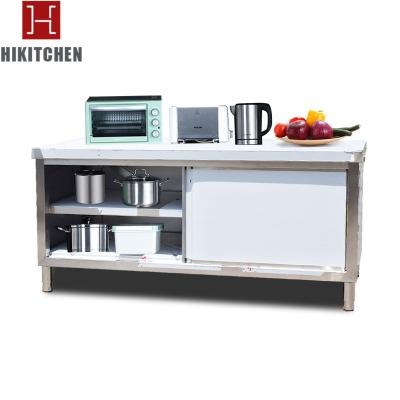 China Durable Kitchen Equipment Adjust Metal Top Shelf Stainless Steel Vegetable Storage Sliding Door Work Bench Waterproof Commercial Table for sale