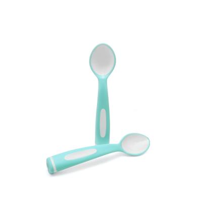 China BPA Free Mother and Baby Products Grapefruit Bud Baby Training Spoon Position Baby Spoon for sale