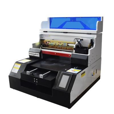 China Hotels 6090 Mini Flatbed Uv Printer With Rotary Attachment Price With Rotary Attachment for sale