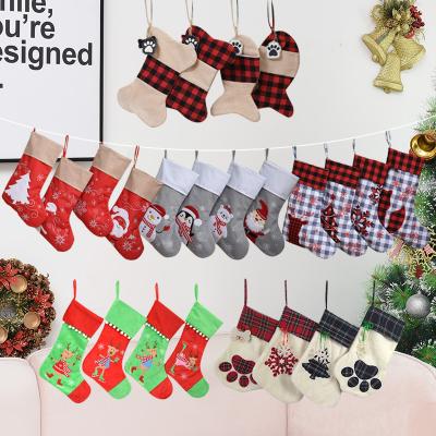 China Cloth Christmas Buffalo Plaid Stocking Christmas Tree Stocking New Year Gift Bag Hanging Candy Sock Bags Home Decor Pendant Ornaments for sale