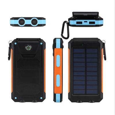 China Hot Selling High Capacity 20000mAh Solar Power Bank Universal Charging Portable Waterproof Solar Panel With Camping Light for sale